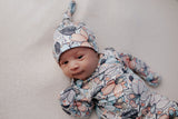 knotted baby gown for a newborn photo shoot