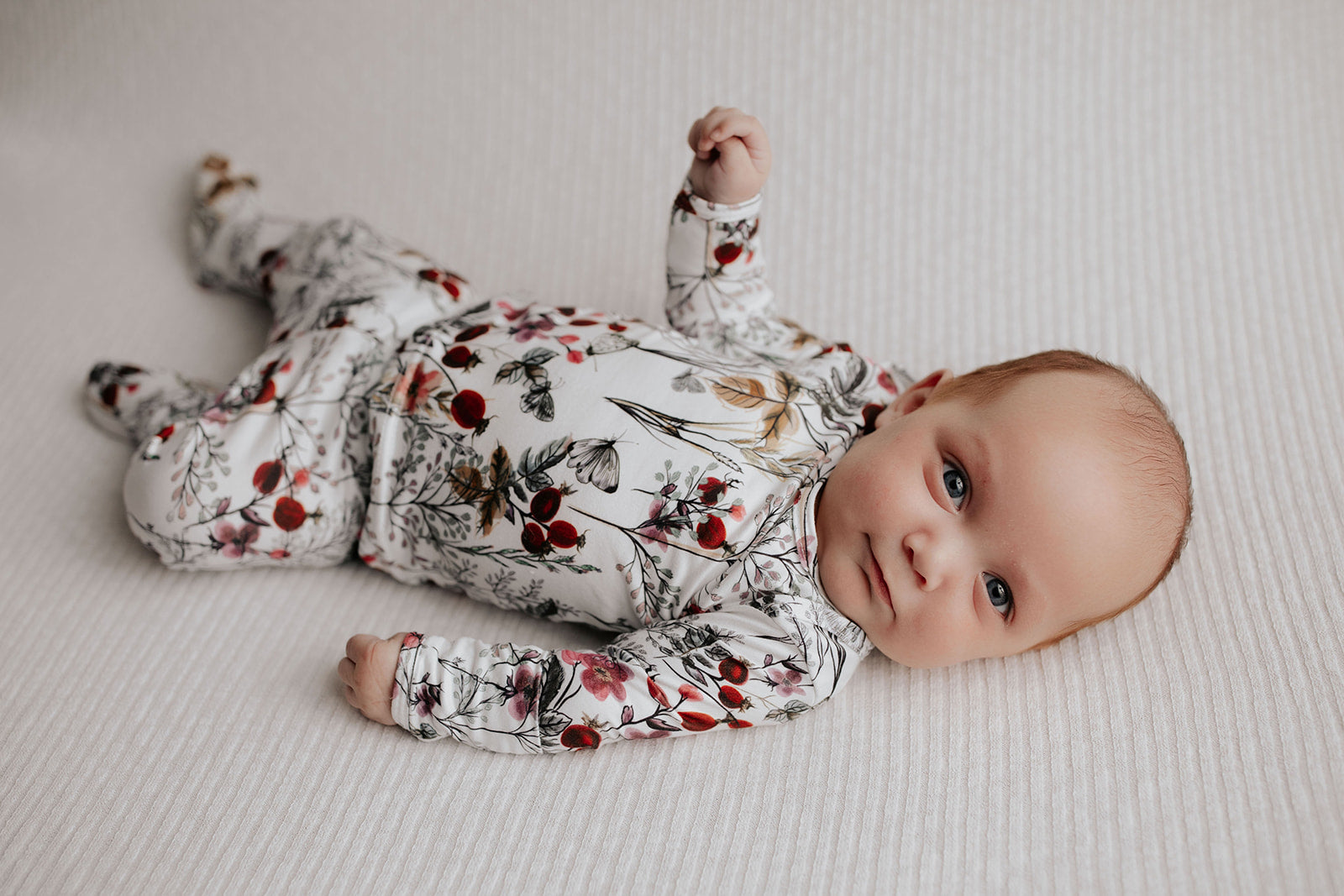 Newborn Jammies feature buttery-soft fabric, fold-over mittens, and footies for ultimate comfort and style.