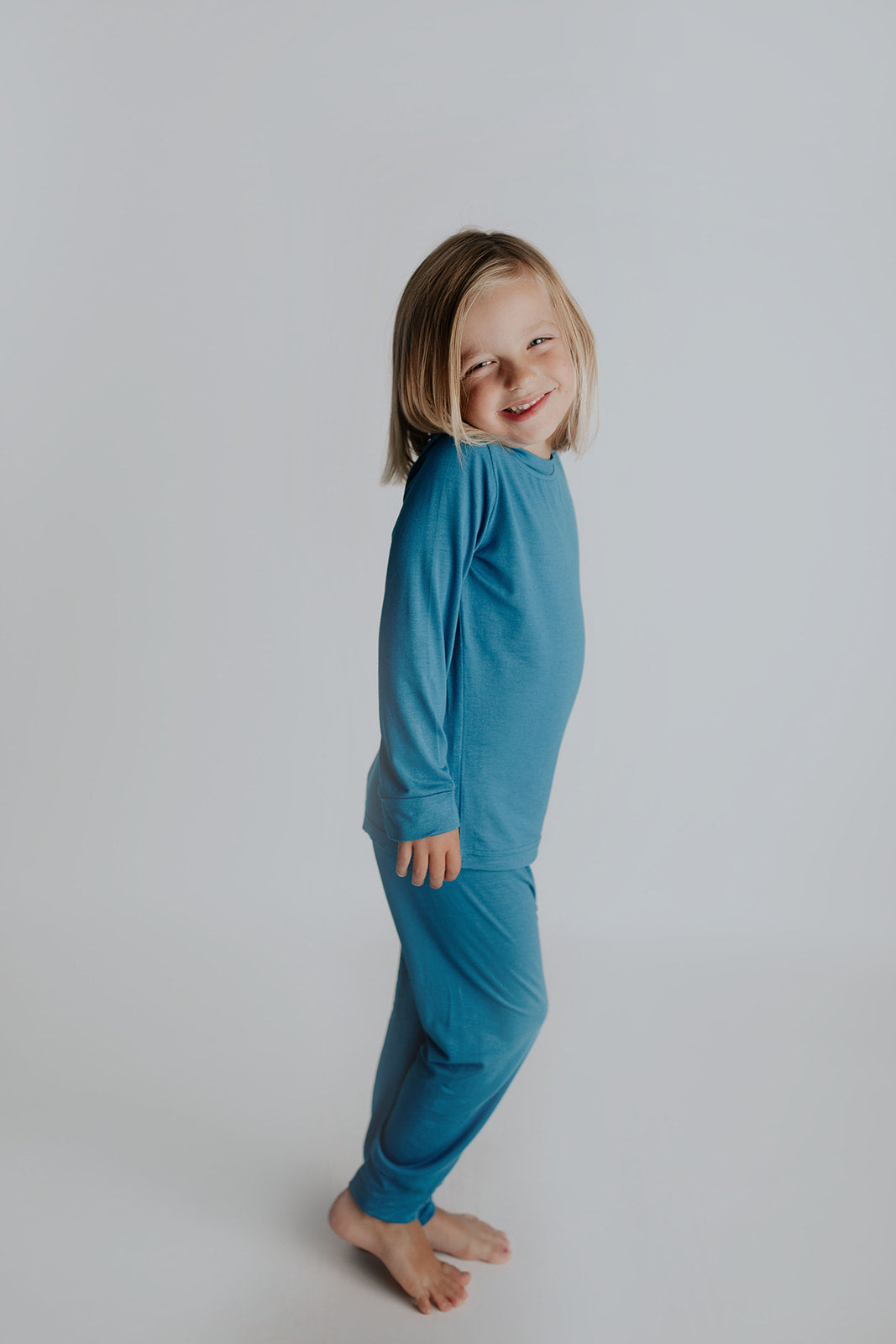 Toddler and big kid jammies in matching prints and solids, designed for comfy bedtime or lounging all day.