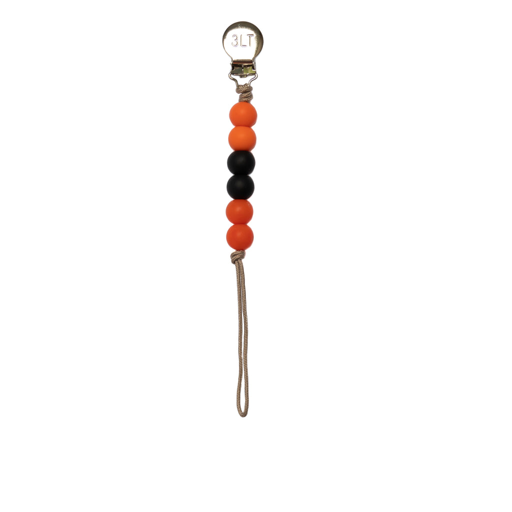 Perfect for your little one's Halloween outfit! Made in the USA, Three Little Tots Paci clips feature 6 silicone beads.