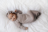 Hand-tied and made with love. Our popular buttery soft and stretchy knotted headbands are perfect for your little girl!