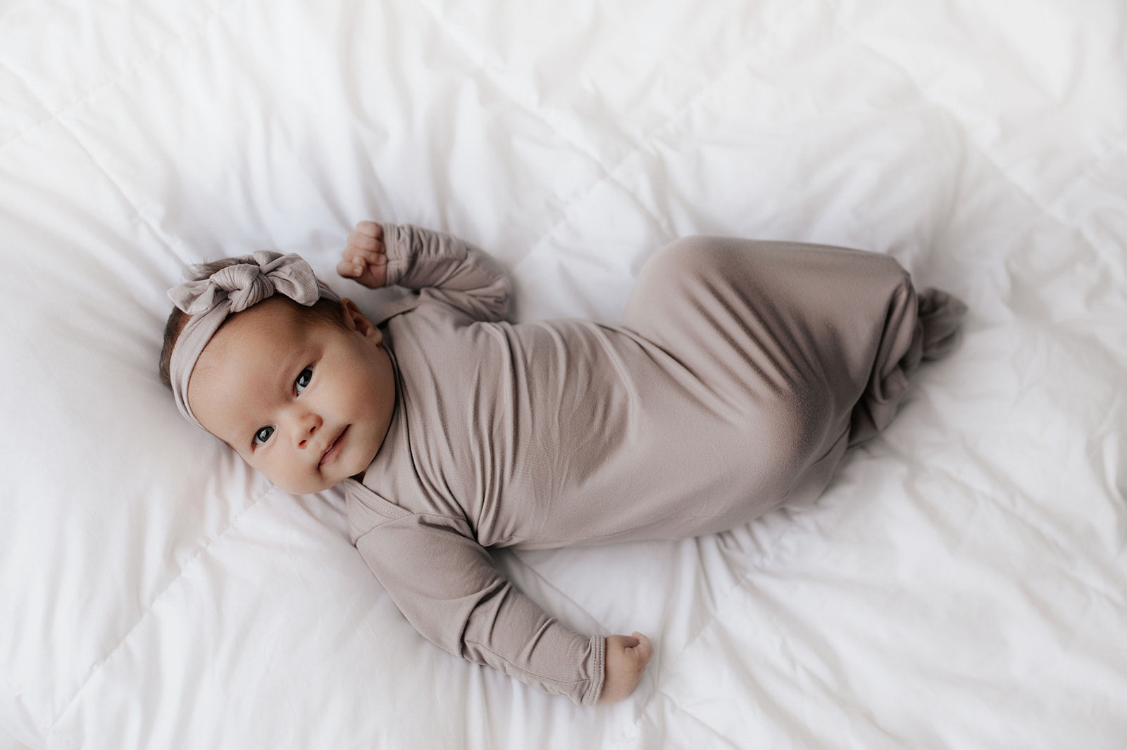 Hand-tied and made with love. Our popular buttery soft and stretchy knotted headbands are perfect for your little girl!