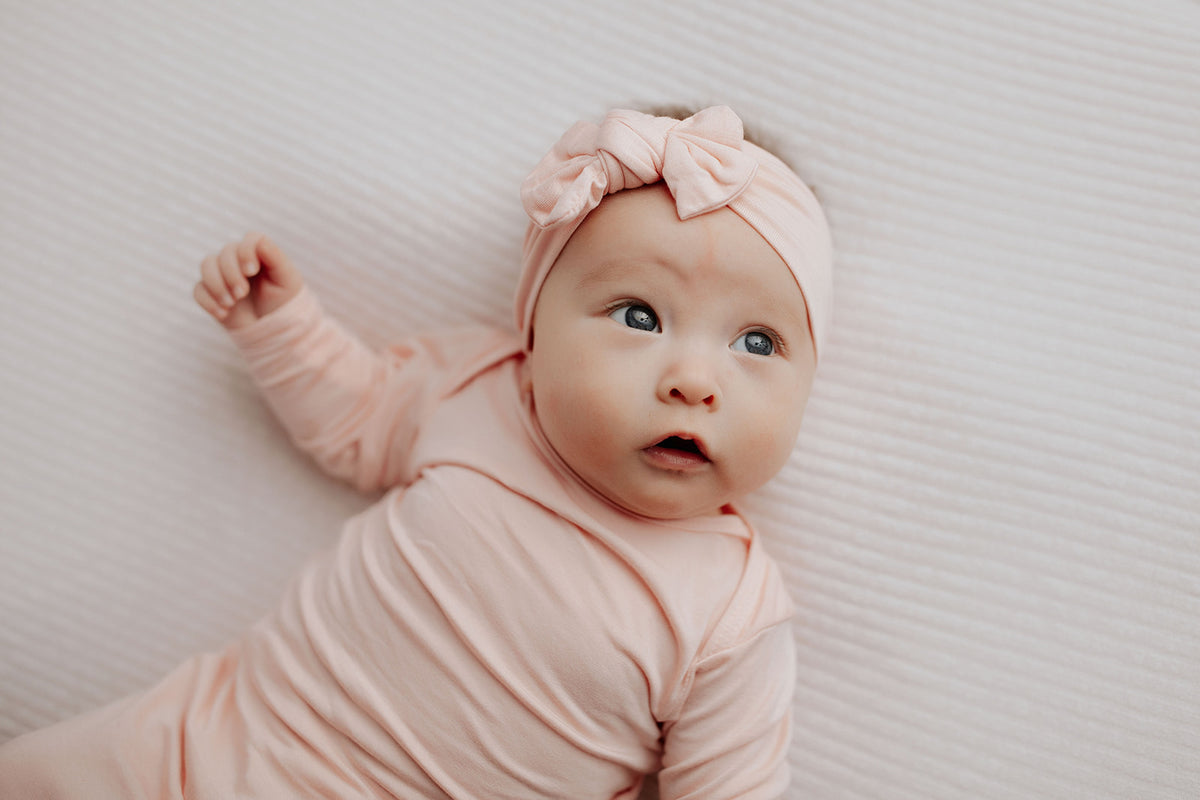 Trust in our modal knotted baby gowns, providing unparalleled comfort and ease for your newborn baby's delicate skin.