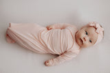 precious photo of newborn baby in the Three Little Tots Heavenly Pink knotted baby gown