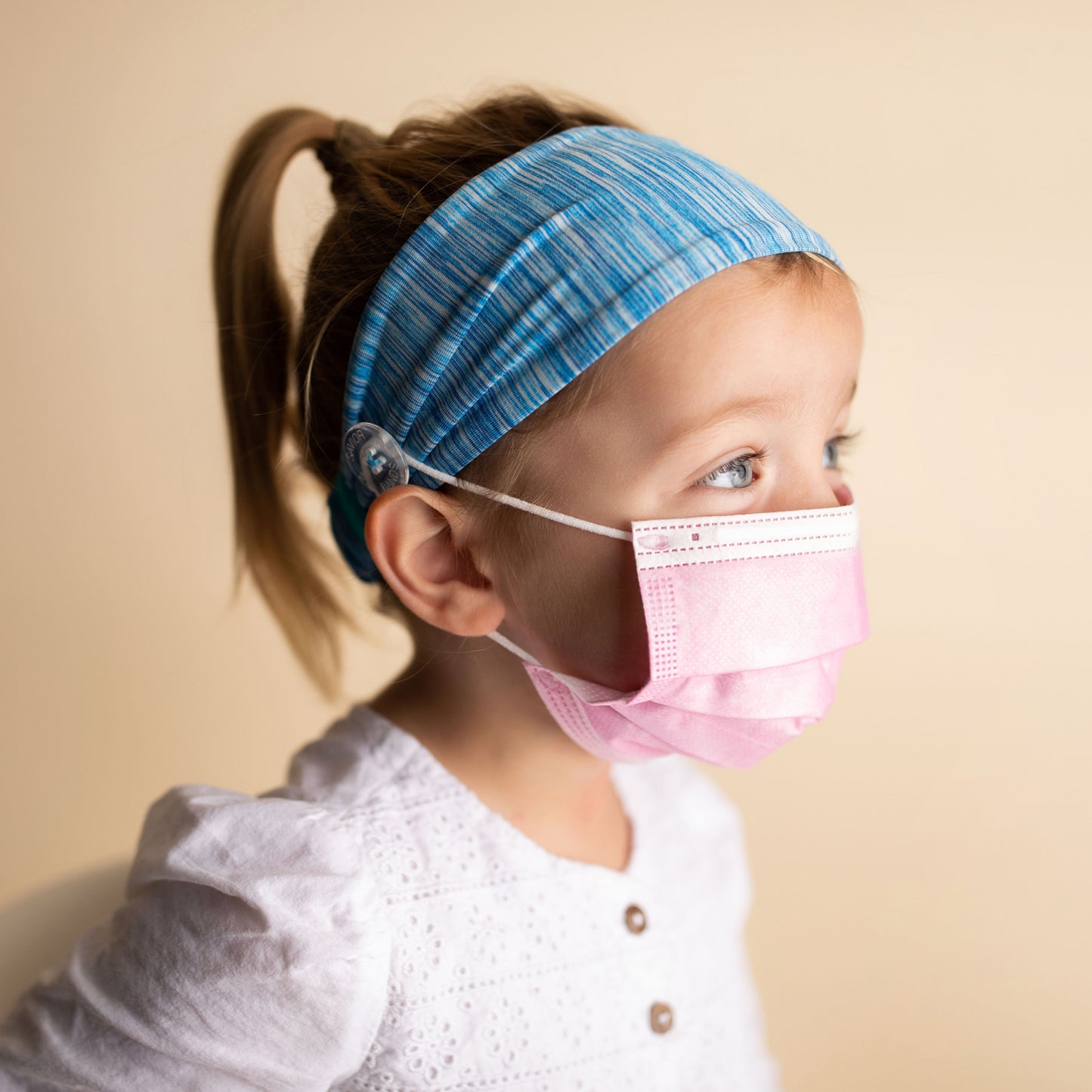 Comfortable headbands with mask-saving buttons for kids, perfect for long-term mask wearers like children with Leukemia.