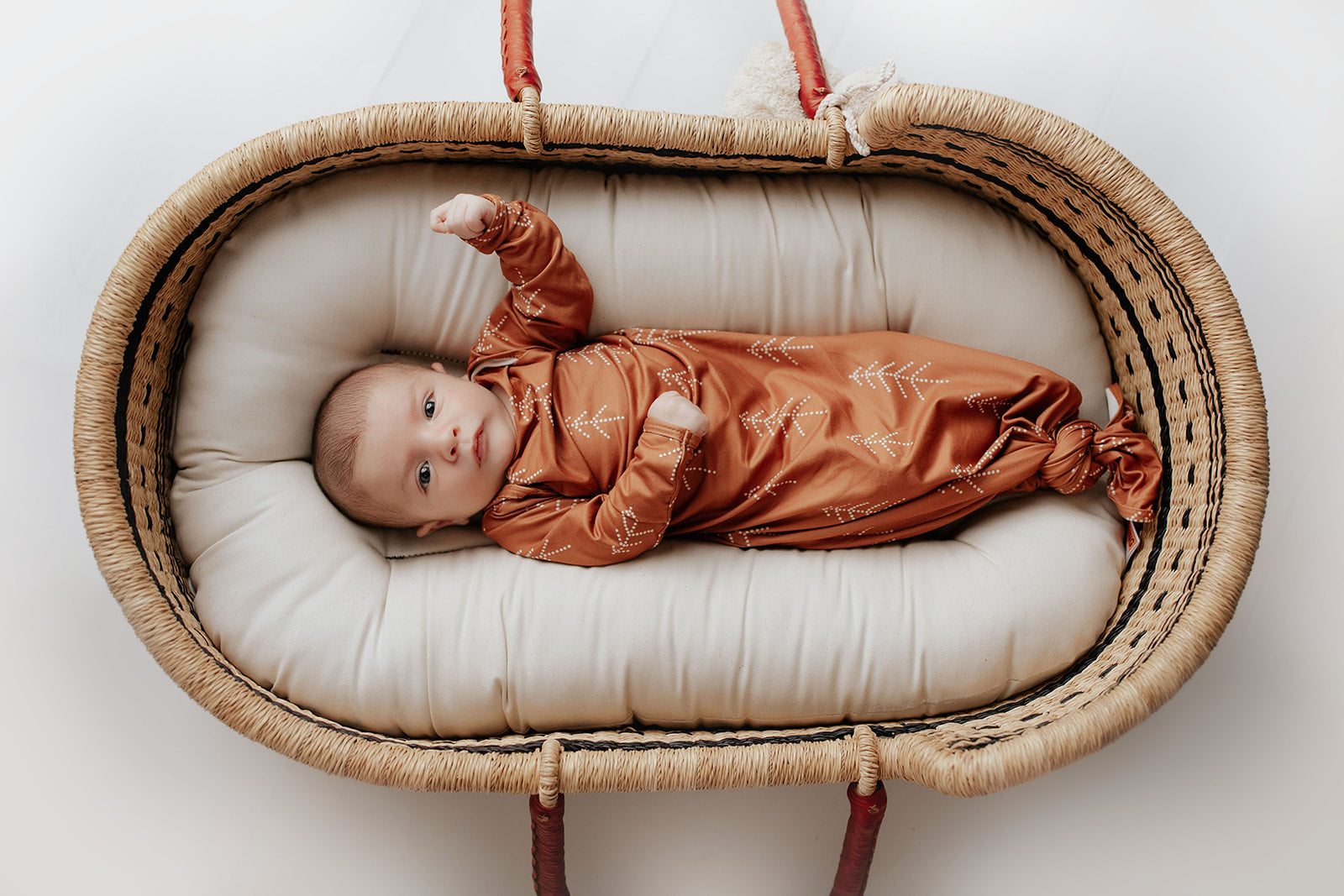 Super soft Christmas-themed baby gowns with stretchy fabric and easy-access tie bottom for quick diaper changes.