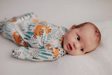 Ultra-soft Dinosaur baby gowns with stretchy fabric and tie bottom for easy night-time diaper changes.