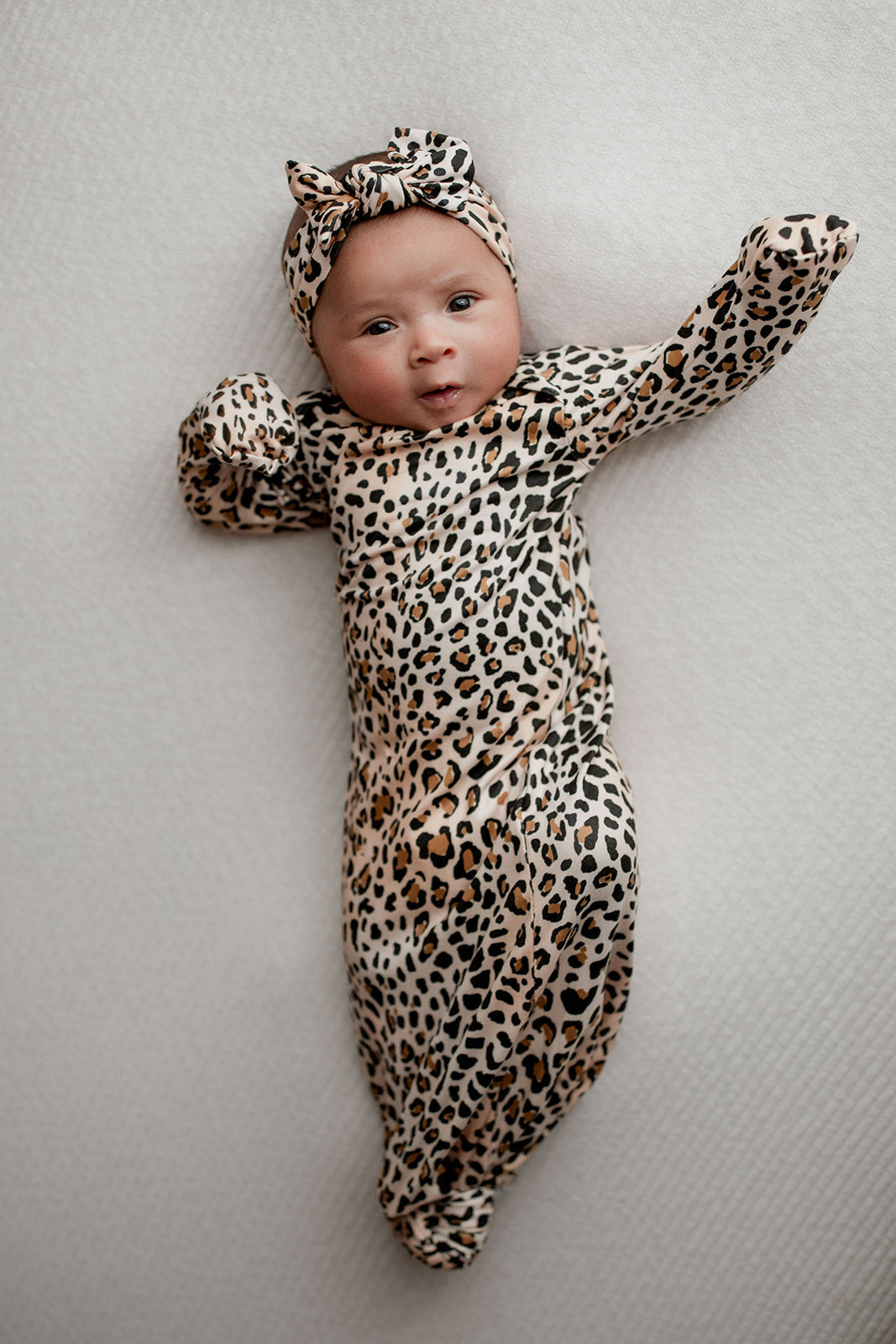 Fold over mittens on the Three Little Tots Leopard Knotted baby gowns