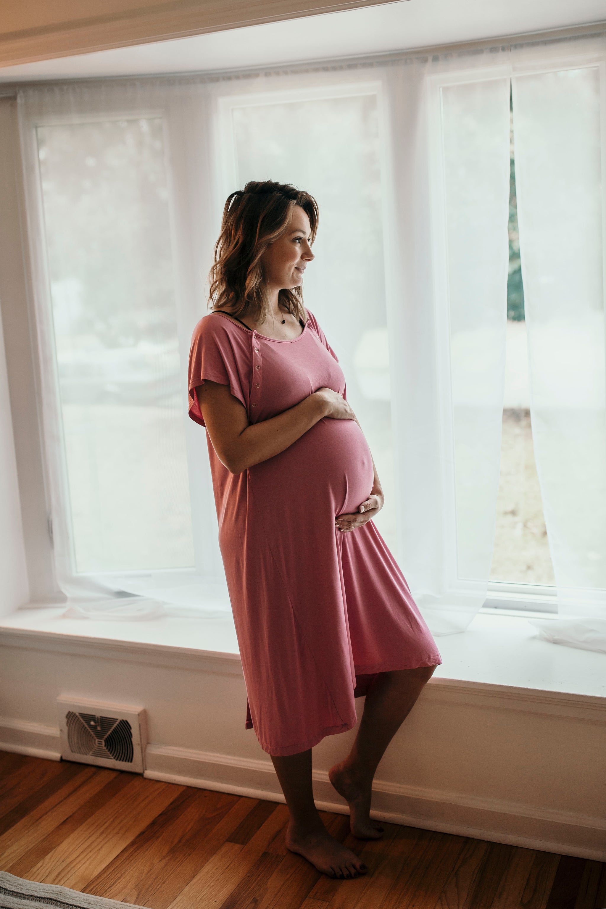 Relaxing in the Three Little Tots Rose Pink Labor and Delivery Gown
