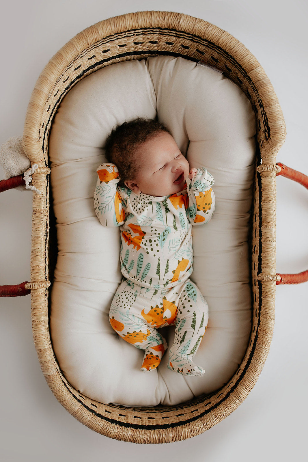Toddler and big kid jammies in matching prints and solids, designed for comfy bedtime or lounging all day. Moses basket by Plum and Sparrow