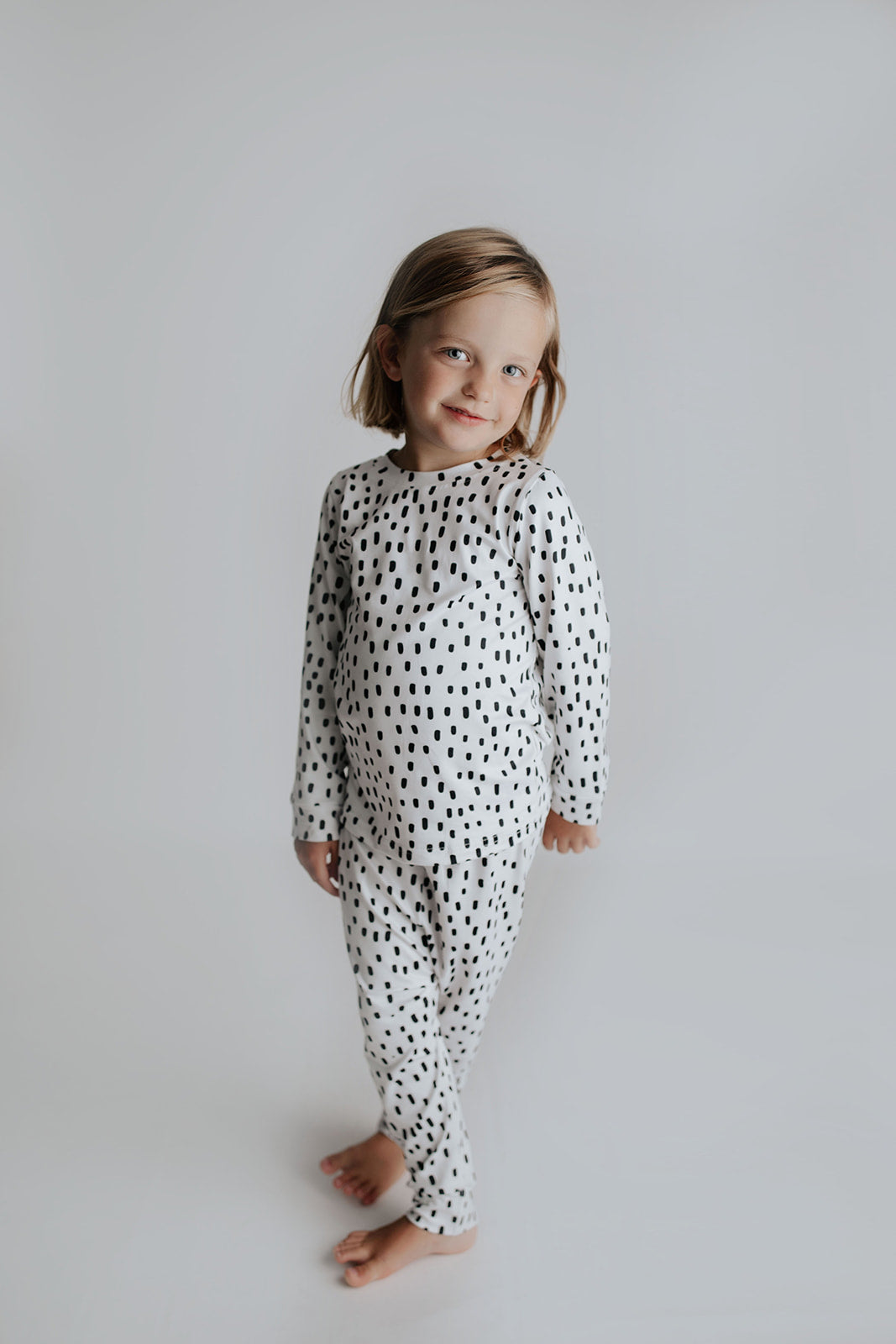 Polka Dot Toddler and big kid jammies in matching prints and solids, designed for comfy bedtime or lounging all day.