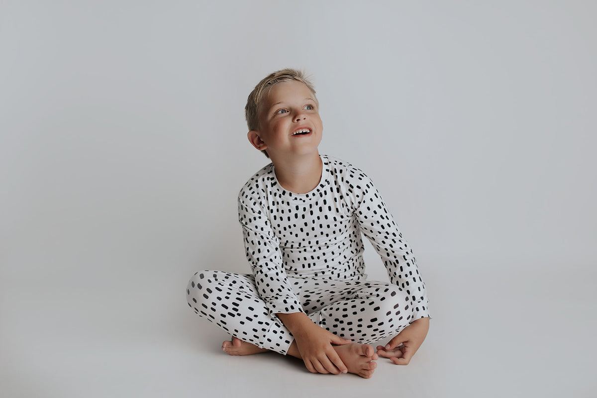 Polka Dot Toddler and big kid jammies in matching prints and solids, designed for comfy bedtime or lounging all day.