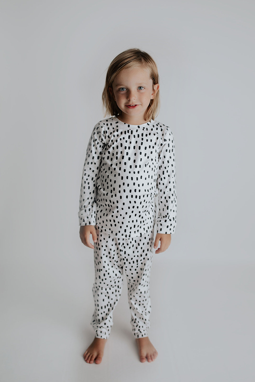 Polka Dot Toddler and big kid jammies in matching prints and solids, designed for comfy bedtime or lounging all day.
