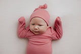 Luxuriously soft modal knotted baby gowns for newborn babies, offering comfort, easy diaper changes, and style. Three Little Tots Rose Pink Knotted baby gown. Knotted tie bottom mimics the womb to bring comfort to your newborn