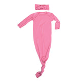 Luxuriously soft modal knotted baby gowns for newborn babies, offering comfort, easy diaper changes, and style.