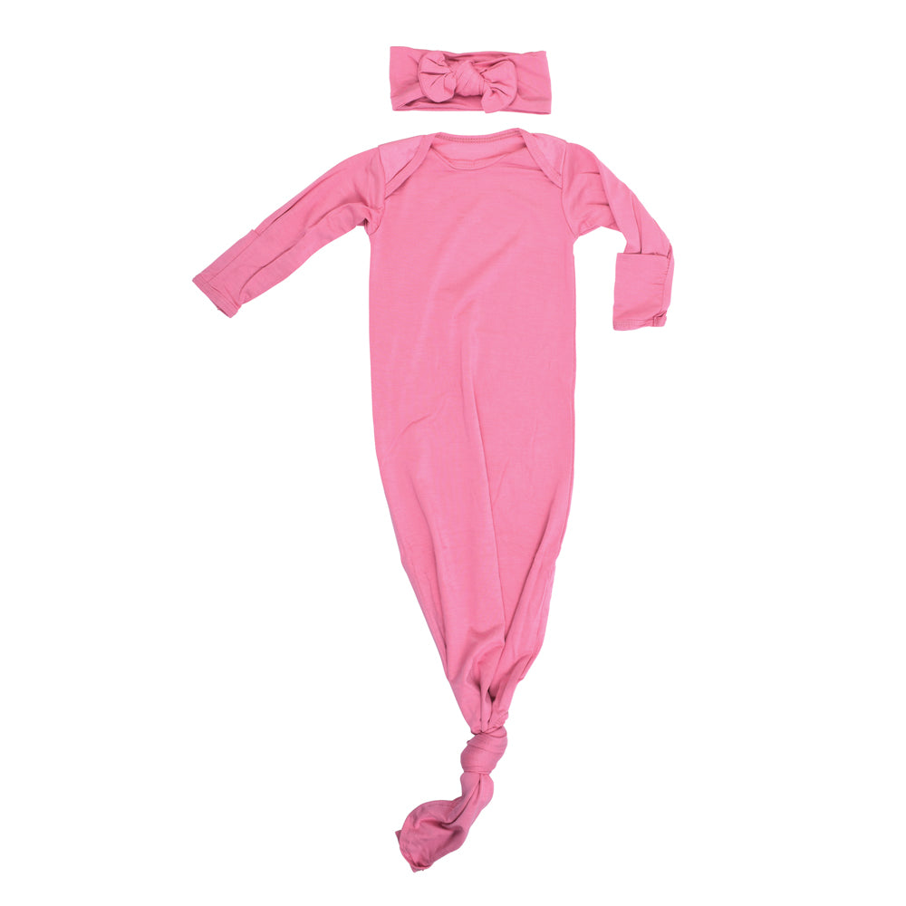 Luxuriously soft modal knotted baby gowns for newborn babies, offering comfort, easy diaper changes, and style.
