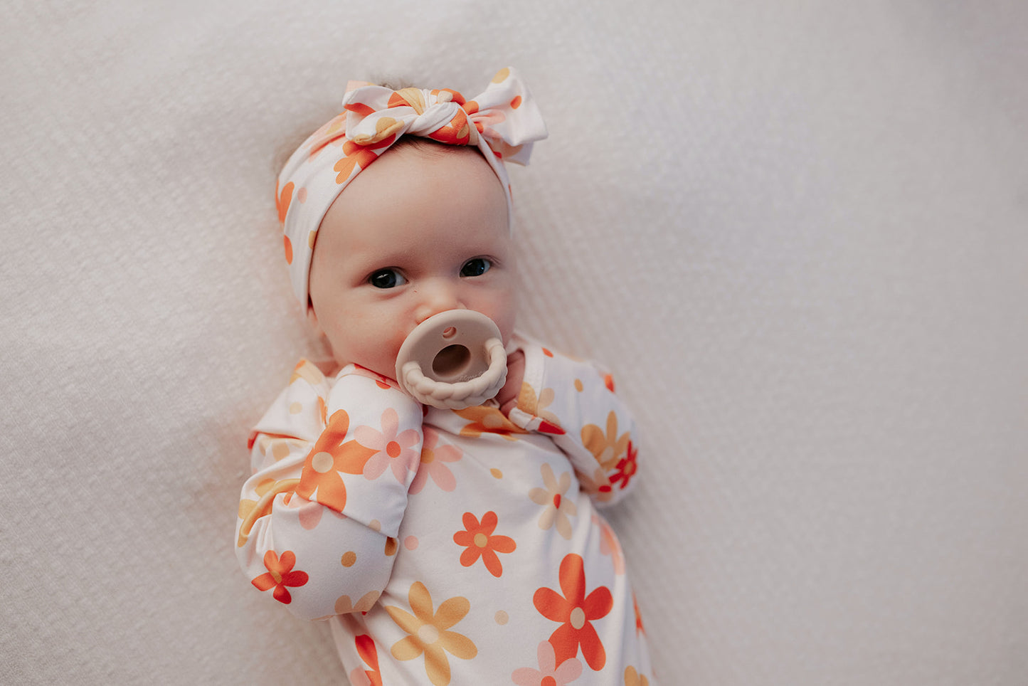 Hand-tied and made with love. Our popular buttery soft and stretchy knotted headbands are perfect for your little girl!