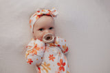 Hand-tied and made with love. Our popular buttery soft and stretchy knotted headbands are perfect for your little girl!
