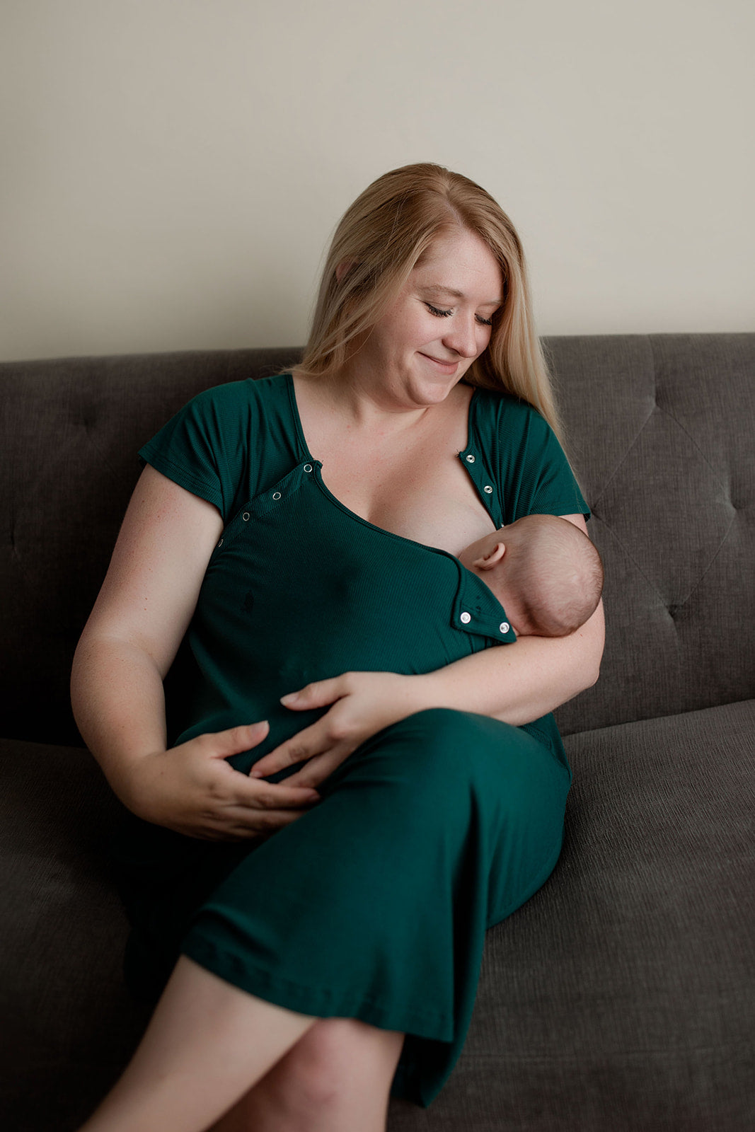 Mom breastfeeding and doing skin on skin with newborn in a Three Little Tots Labor and Delivery Gown