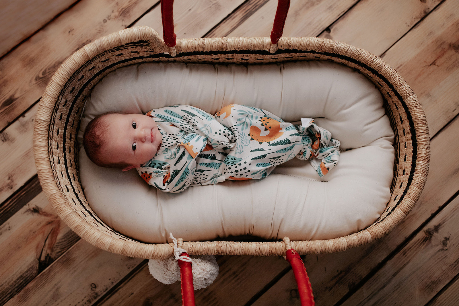 Ultra-soft Dinosaur baby gowns with stretchy fabric and tie bottom for easy night-time diaper changes.