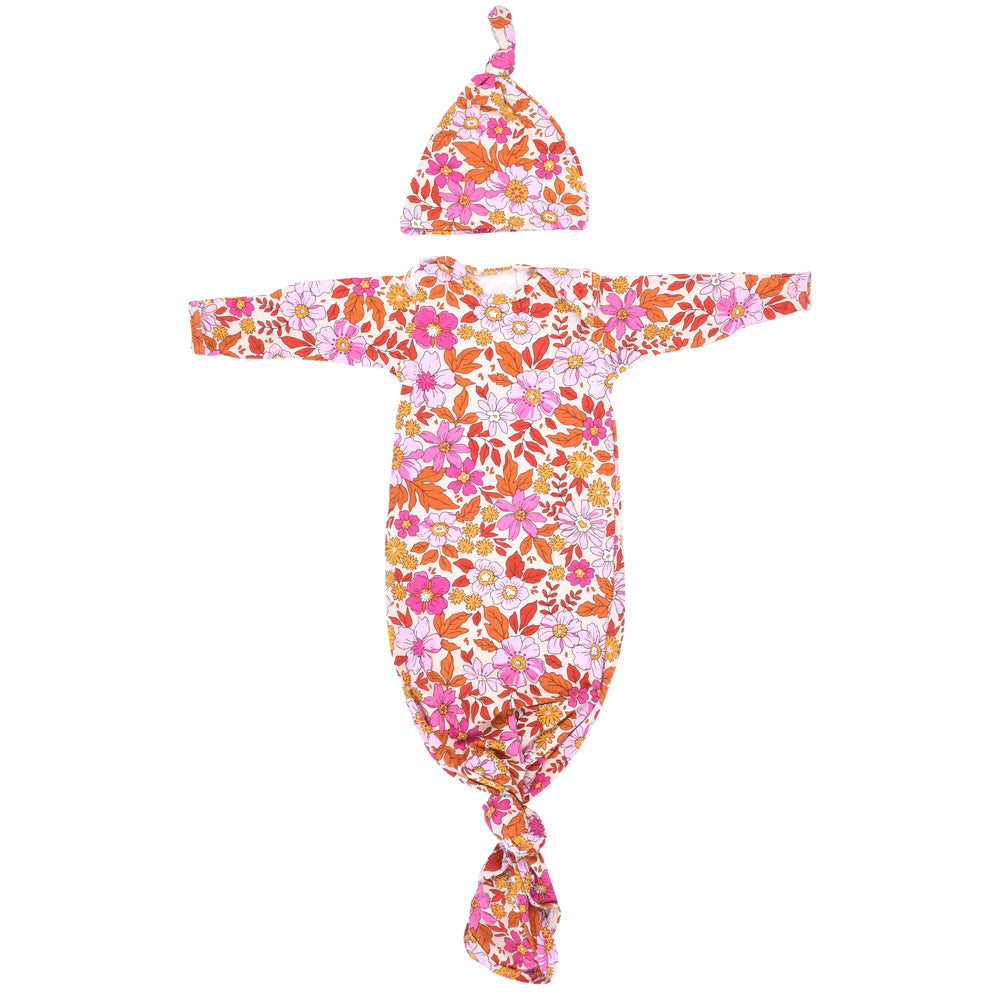 The cutest pink floral design for a newborn knotted baby gown. Trust in our knotted baby gowns, providing unparalleled comfort and ease for your baby's delicate skin.