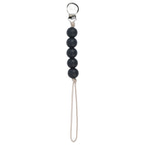 Three Little Tots Silicone pacifier clip with black beads. Handmade in the USA.