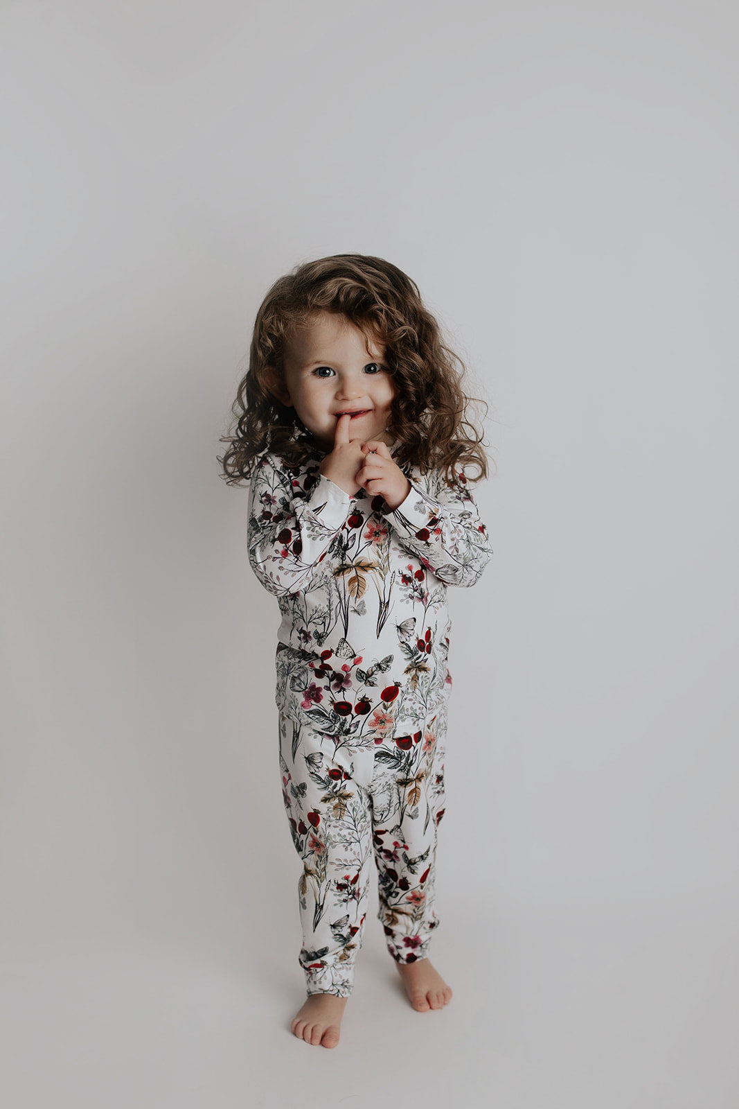 super cute little girl in floral Three Little Tots Pjs