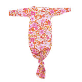 The cutest pink floral design for a newborn knotted baby gown. Trust in our knotted baby gowns, providing unparalleled comfort and ease for your baby's delicate skin.