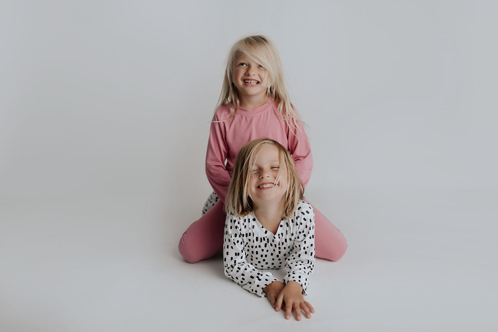 Polka Dot Toddler and big kid jammies in matching prints and solids, designed for comfy bedtime or lounging all day.