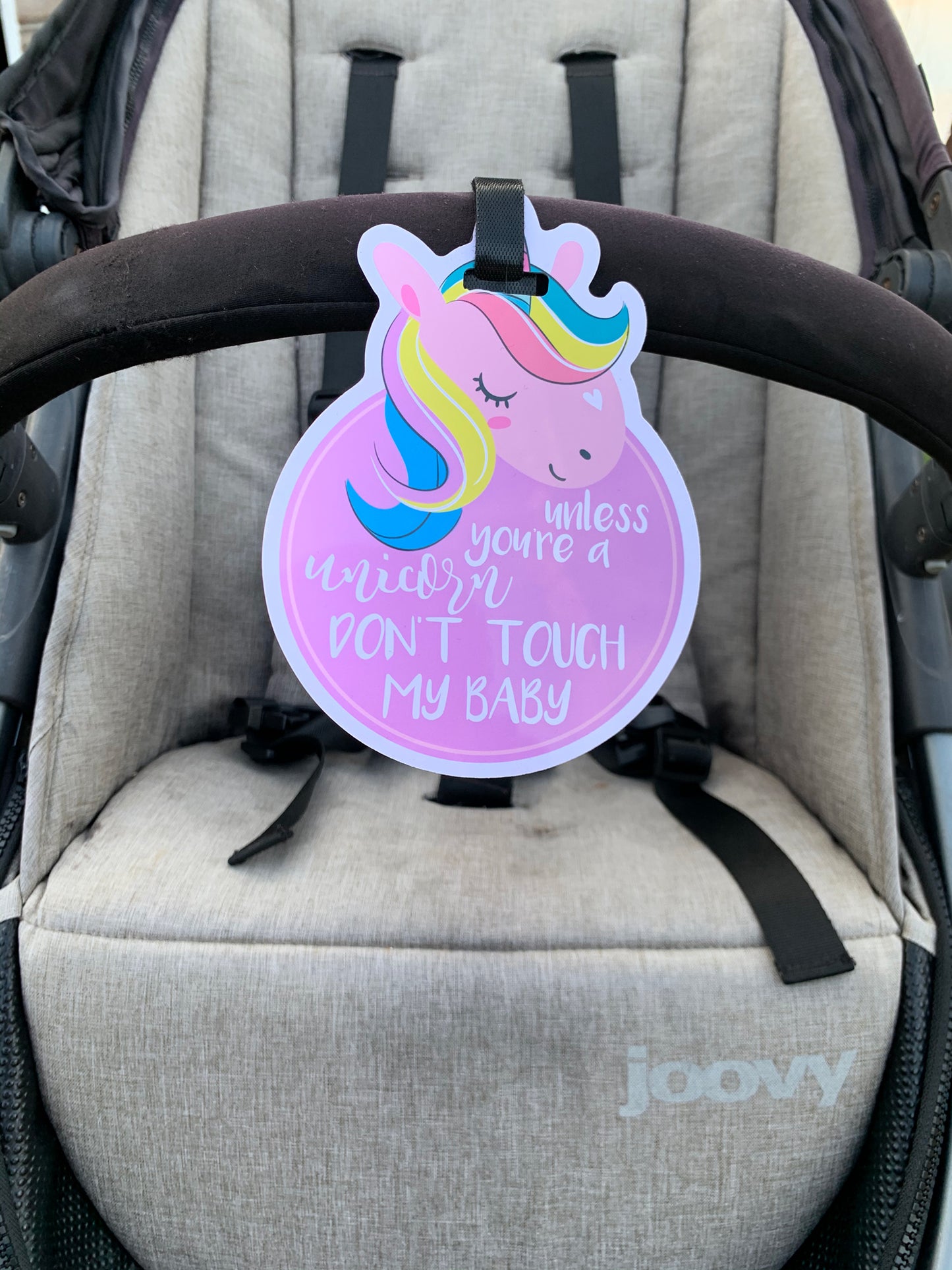 Newborn Unicorn Please Don't Touch My Baby Car Seat Sign on a stroller