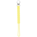 Three Little Tots baby yellow all silicone one piece pacifier clip. This pacifier clip is flexible and easy to clean.