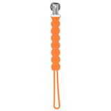 Three Little Tots Orange All Silicone one piece pacifier clip. This pacifier clip is flexible and easy to clean.