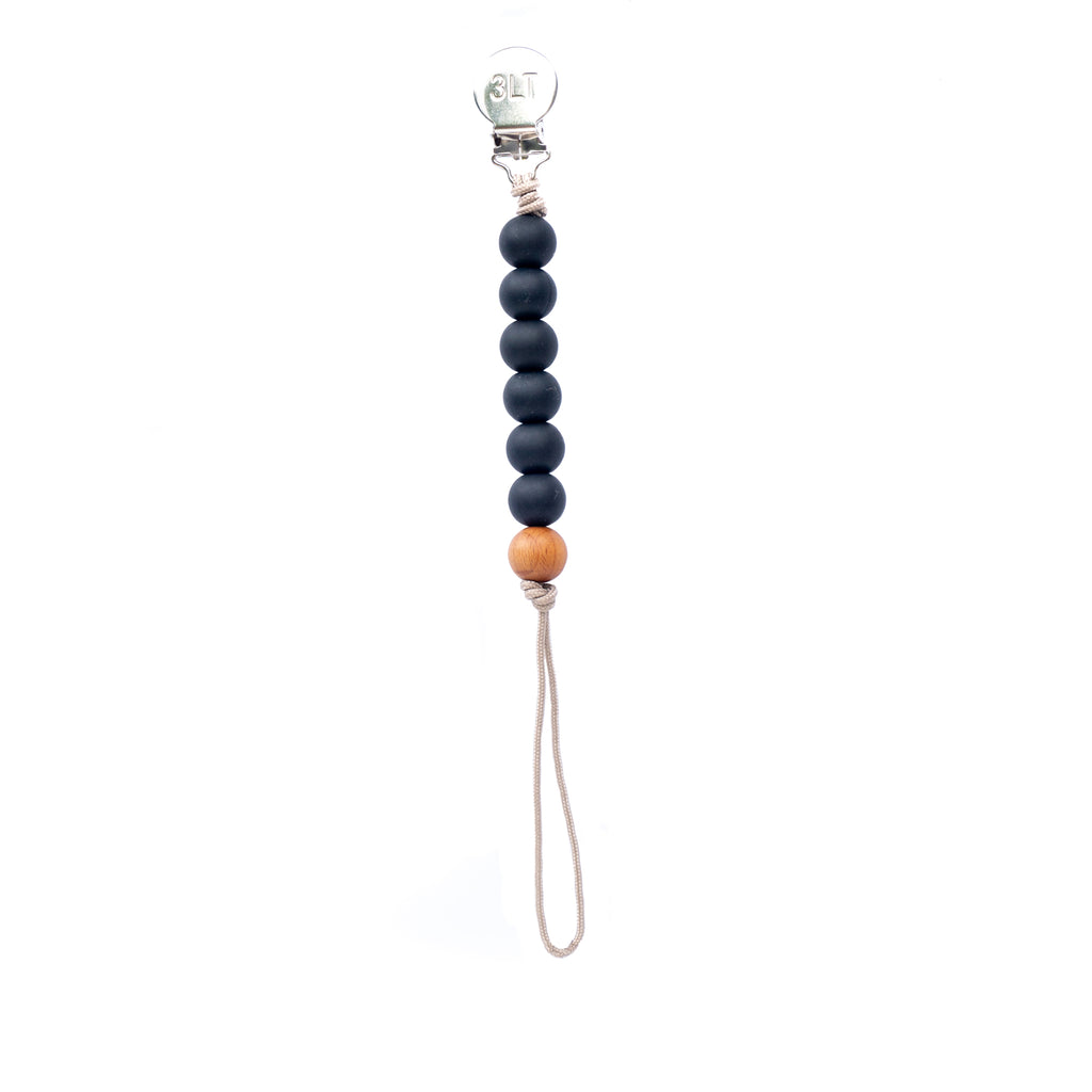 Keep your baby's pacifier secure and stylish with the Three Little Tots Black Silicone Beaded Pacifier Clip Holder.