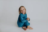 Toddler and big kid jammies in matching prints and solids, designed for comfy bedtime or lounging all day.