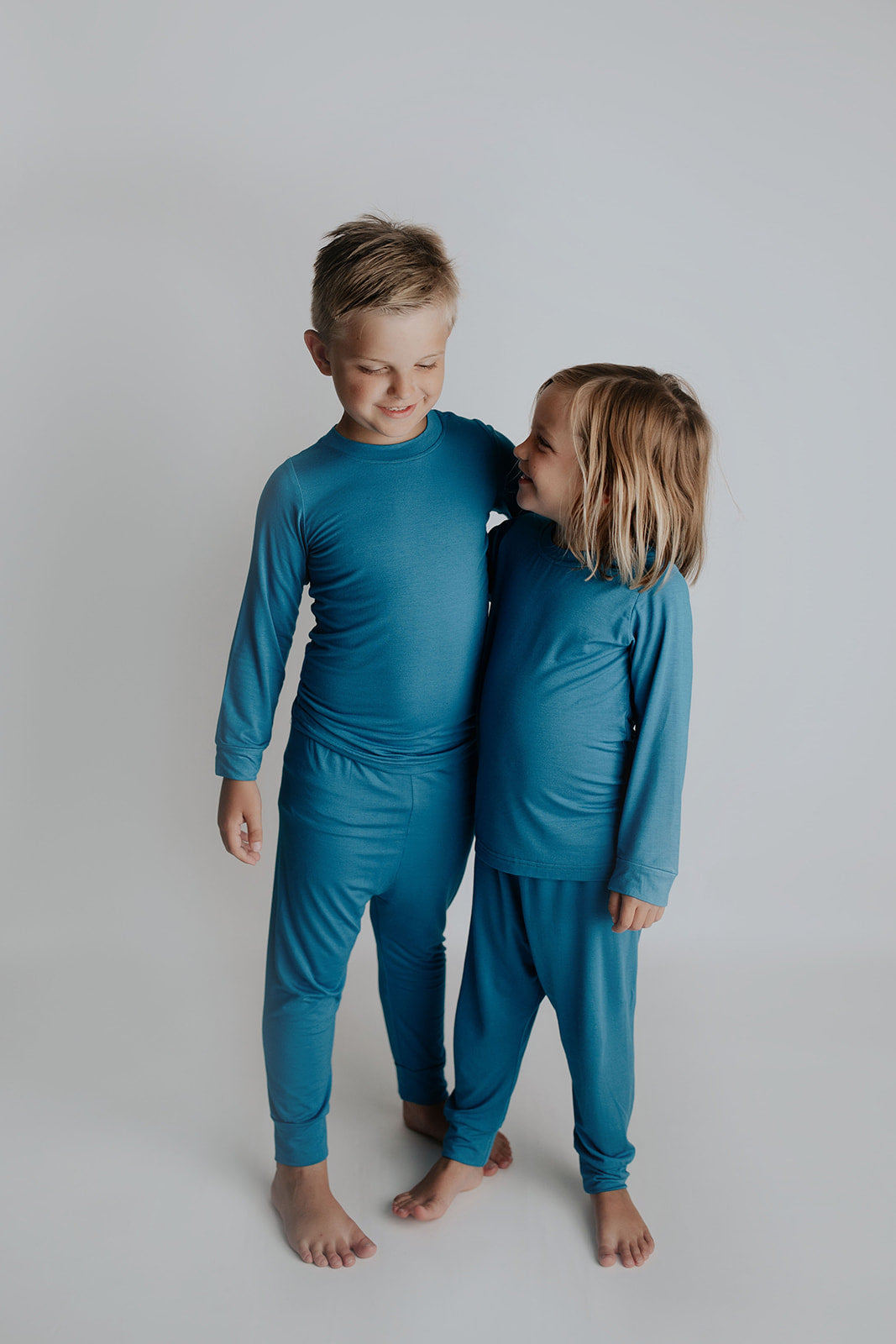 Toddler and big kid jammies in matching prints and solids, designed for comfy bedtime or lounging all day.