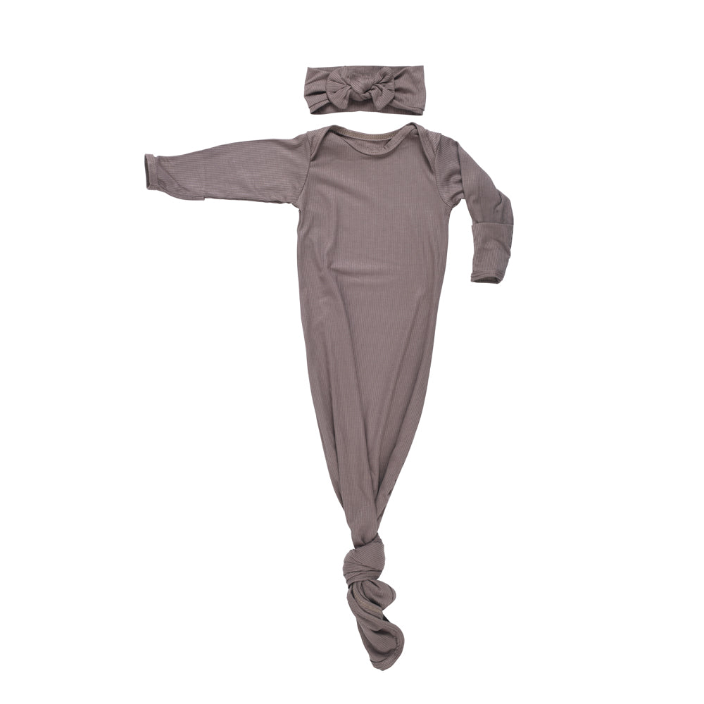 Ultra-soft, stretchy gender neutral baby gowns designed for comfort, featuring tie bottom and pull-down shoulder tabs for convenience.