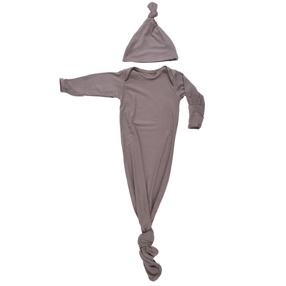 Ultra-soft, stretchy gender neutral baby gowns designed for comfort, featuring tie bottom and pull-down shoulder tabs for convenience.