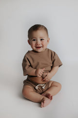 Pre-packed outfits make dressing your baby easy, with irresistibly cute sets everyone will adore.