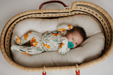 Toddler and big kid jammies in matching prints and solids, designed for comfy bedtime or lounging all day. Moses basket by Plum and Sparrow. Snuggle me newborn 