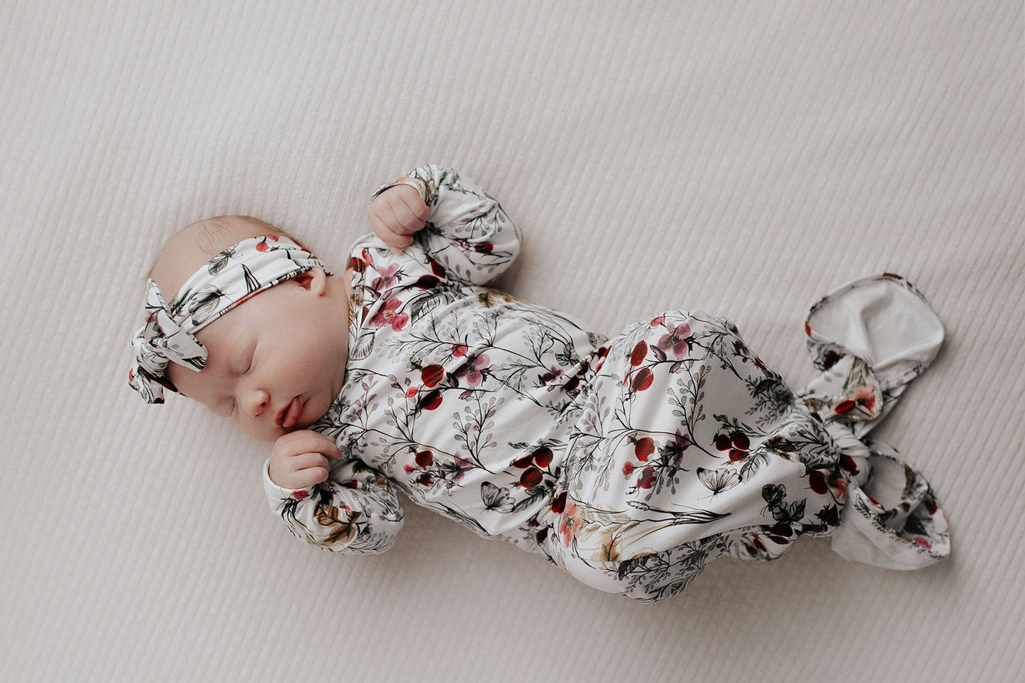 Comfort-focused baby gowns with soft, stretchy material and convenient pull-down tabs for quick dressing and changes.