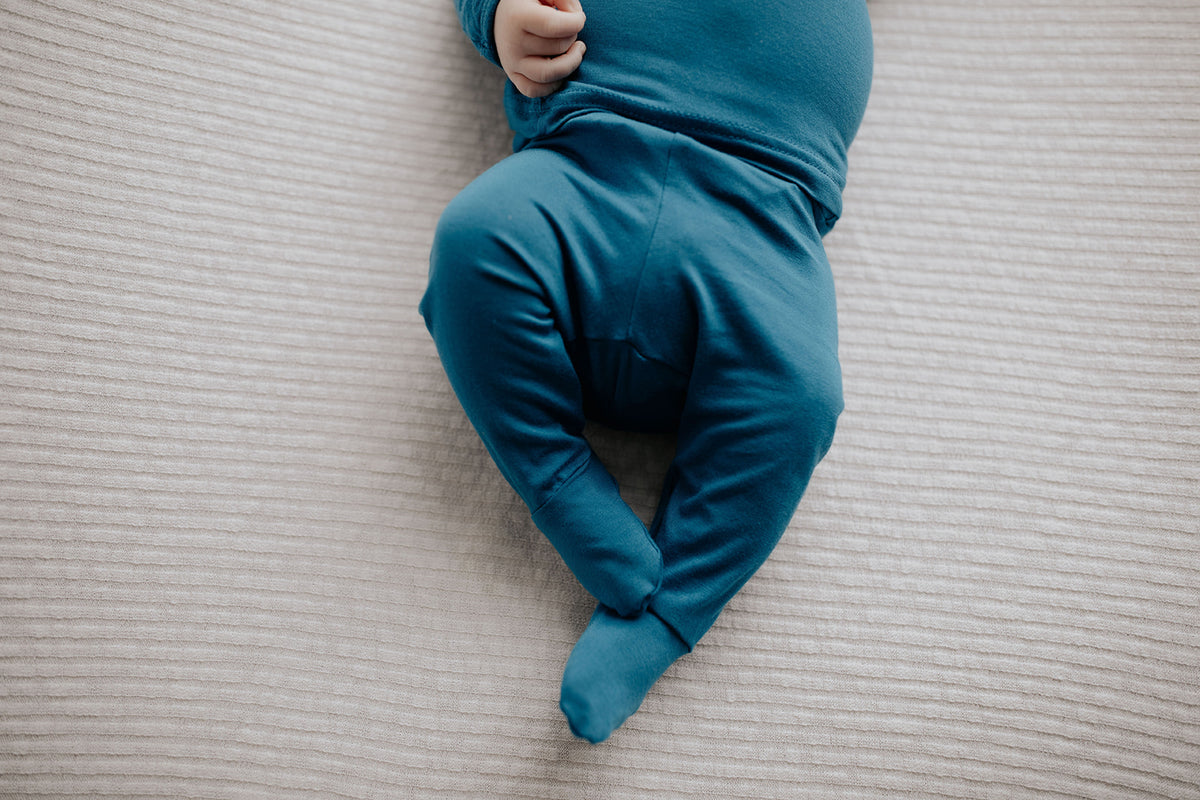 Newborn Jammies with buttery-soft fabric, fold-over mittens, footies for ultimate comfort and all-day coziness.