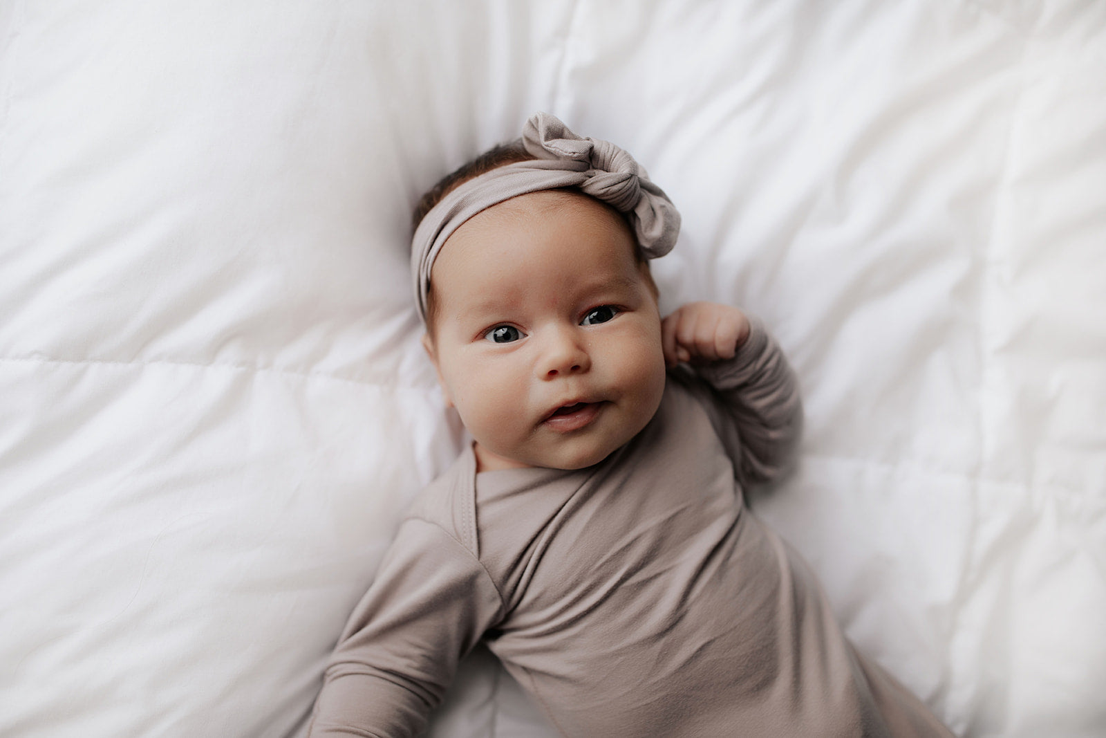 Hand-tied and made with love. Our popular buttery soft and stretchy knotted headbands are perfect for your little girl!