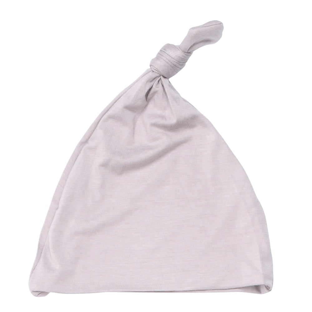 Hand-tied and made with love. Our popular buttery soft and stretchy knotted hats are perfect for your little one!
