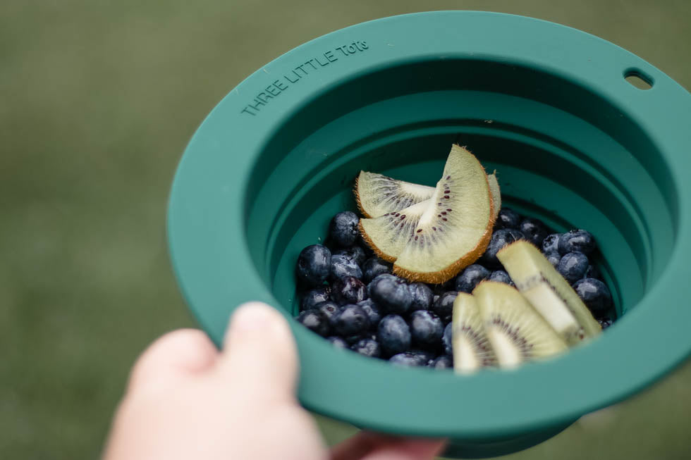 Travel-friendly silicone bowls with double grips, making snack time and cleanup a breeze for moms.