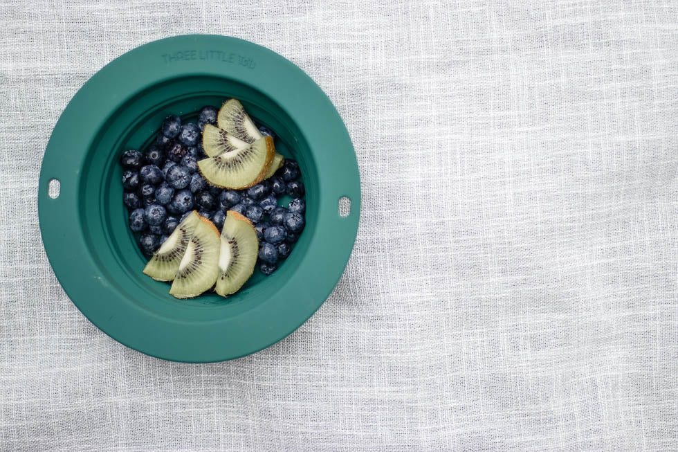 Travel-friendly silicone bowls with double grips, making snack time and cleanup a breeze for moms.