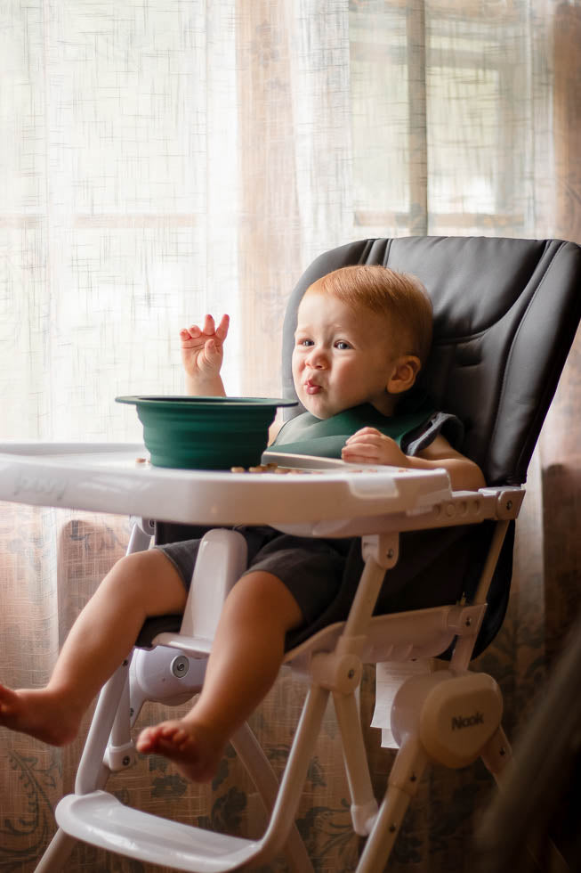 Travel-friendly silicone bowls with double grips, making snack time and cleanup a breeze for moms.