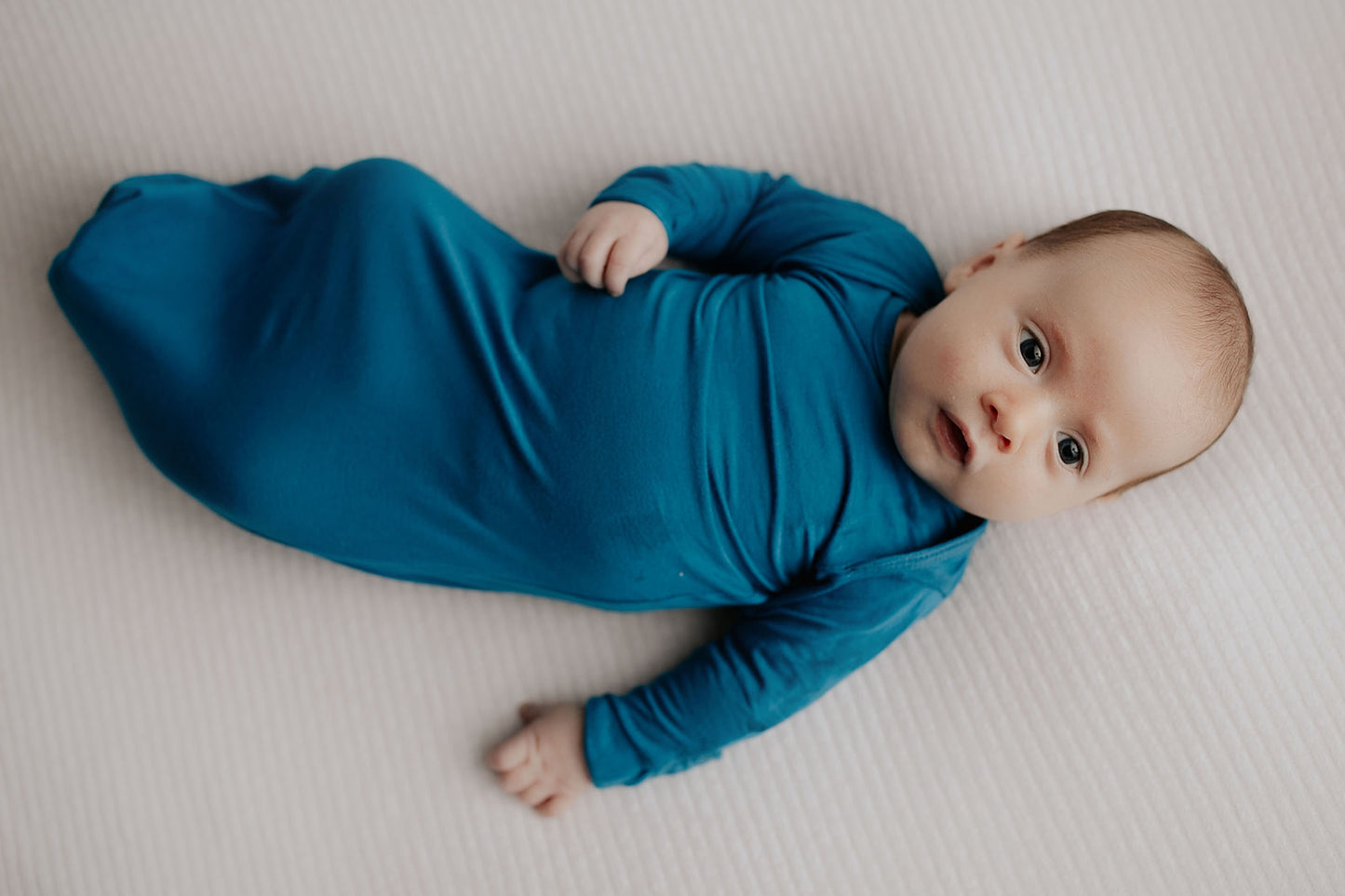 Handpicked fabric blend ensures soft, stretchy baby gowns that simplify night-time changes and dressing.