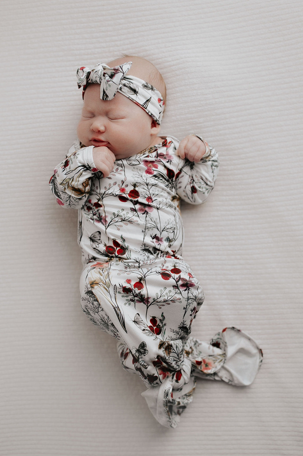 Comfort-focused baby gowns with soft, stretchy material and convenient pull-down tabs for quick dressing and changes.