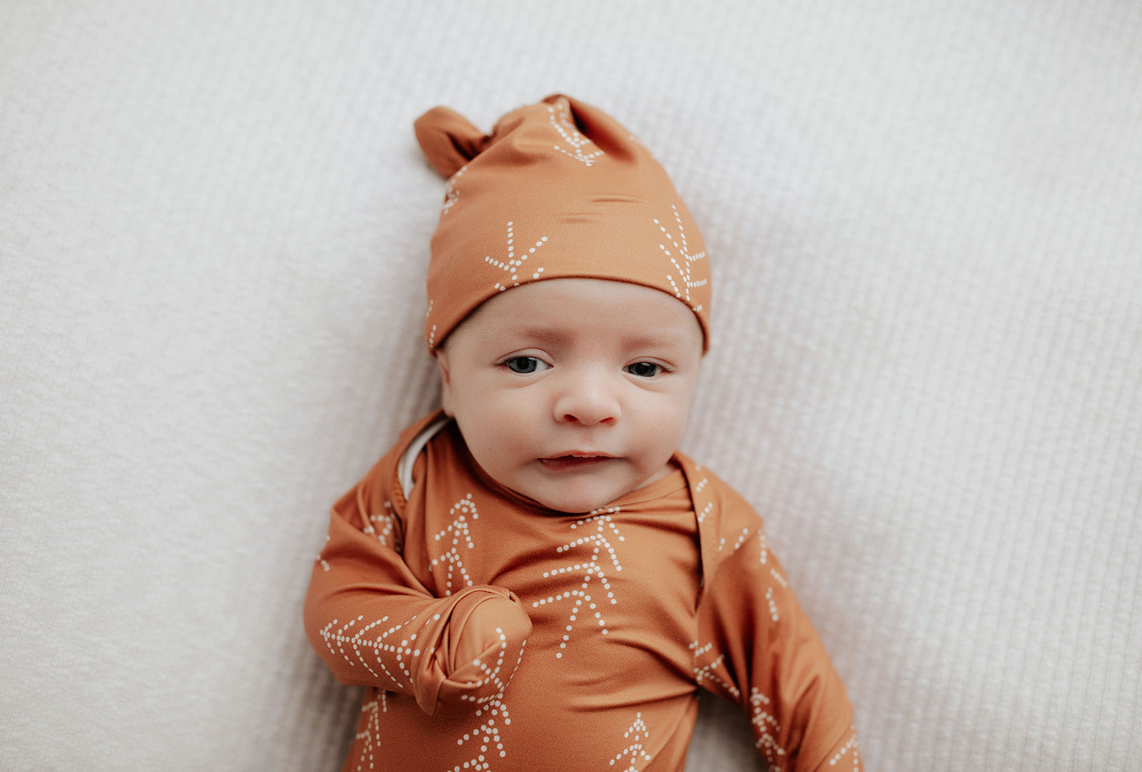 Experience unmatched softness and convenience with our Christmas baby gowns featuring stretchy fabric and tie bottoms.v