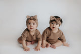 Buttery soft and stretchy knotted headbands, hand-tied for your little girl's comfort and adorable style.